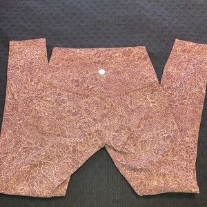Pink/purple floral Lululemon leggings. Size 4